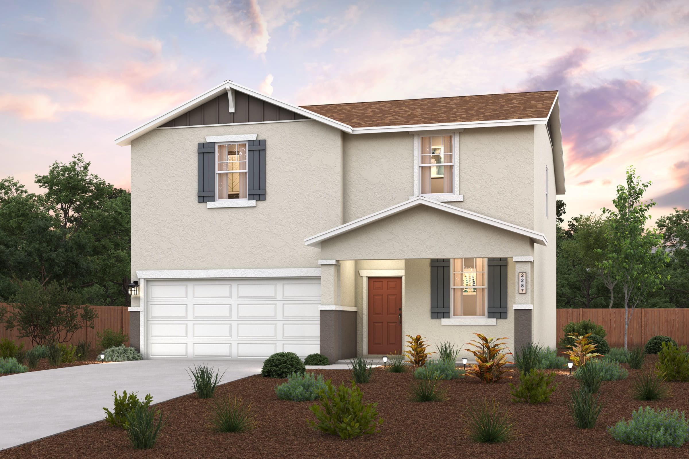 A house with a garage and a driveway.