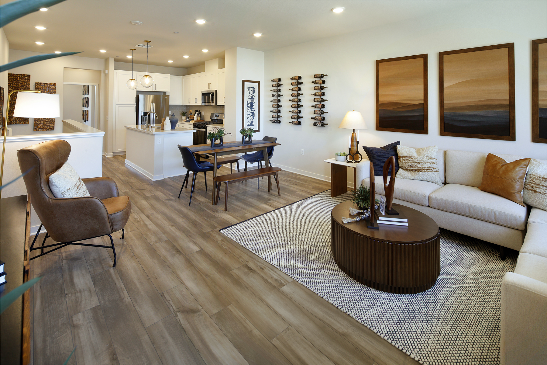 A living room with a wood floor.
