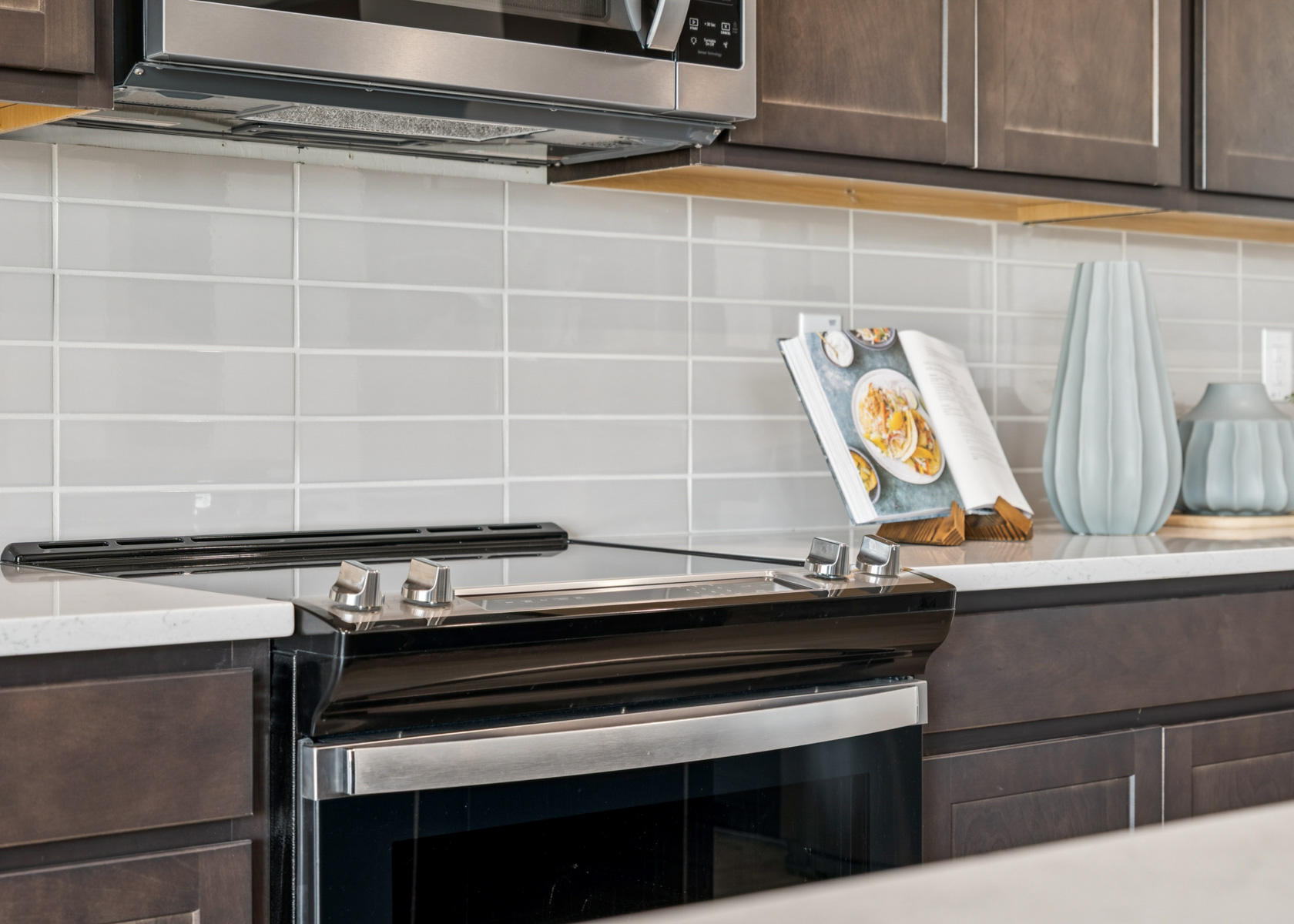 A kitchen with a stove and oven.