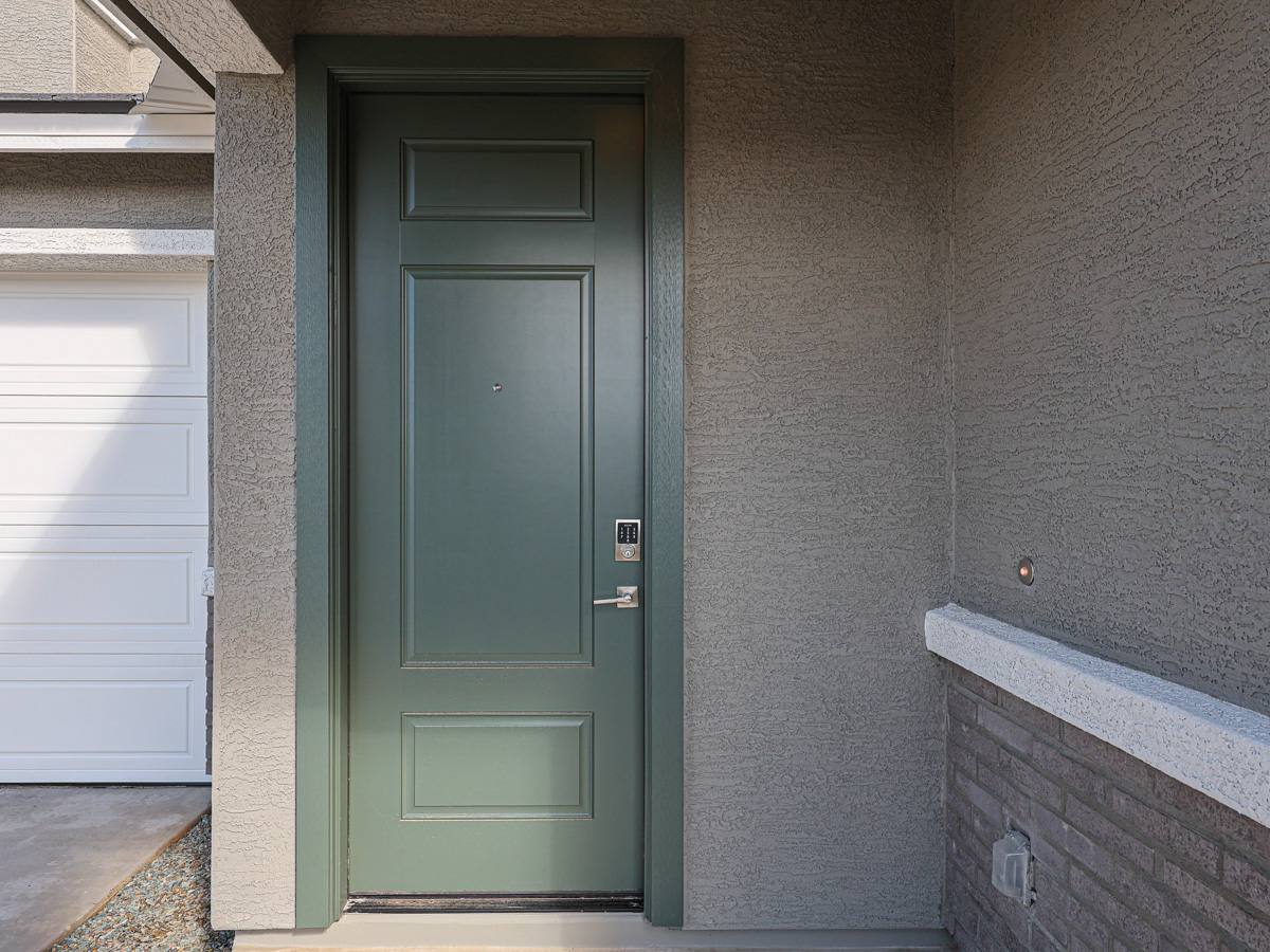 A green door in a building.