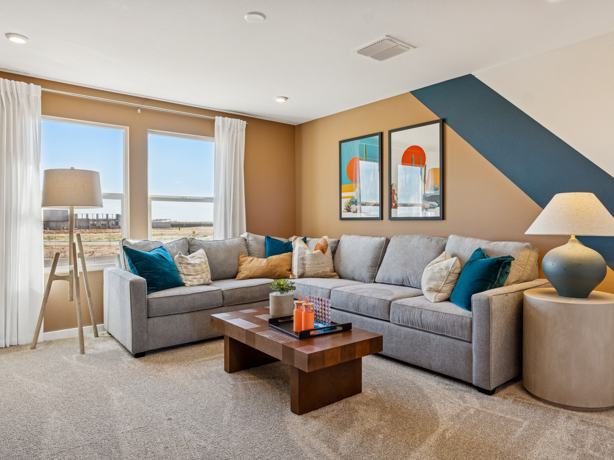 A living room with a couch and a coffee table.