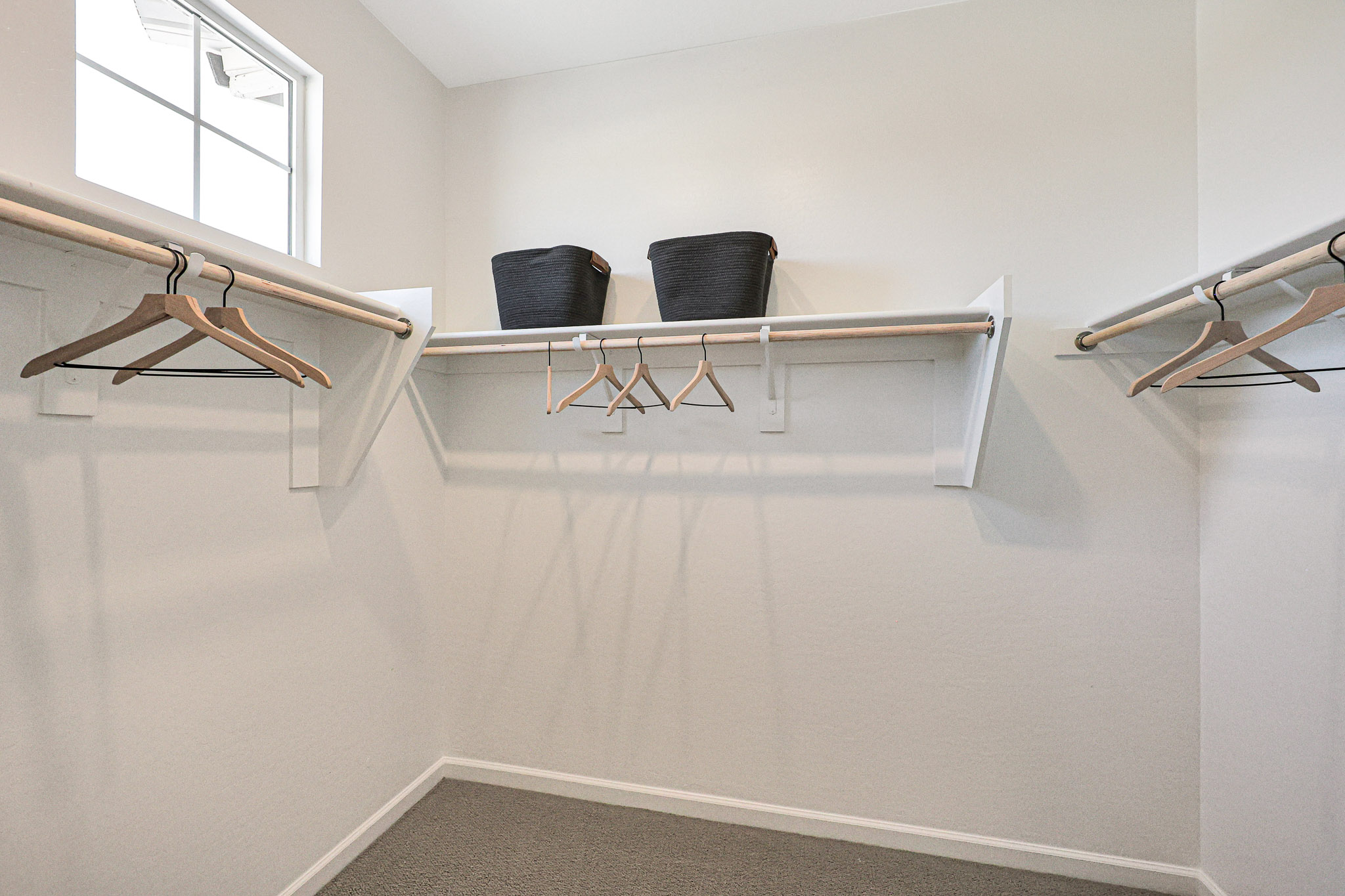 A room with a chair and a table.