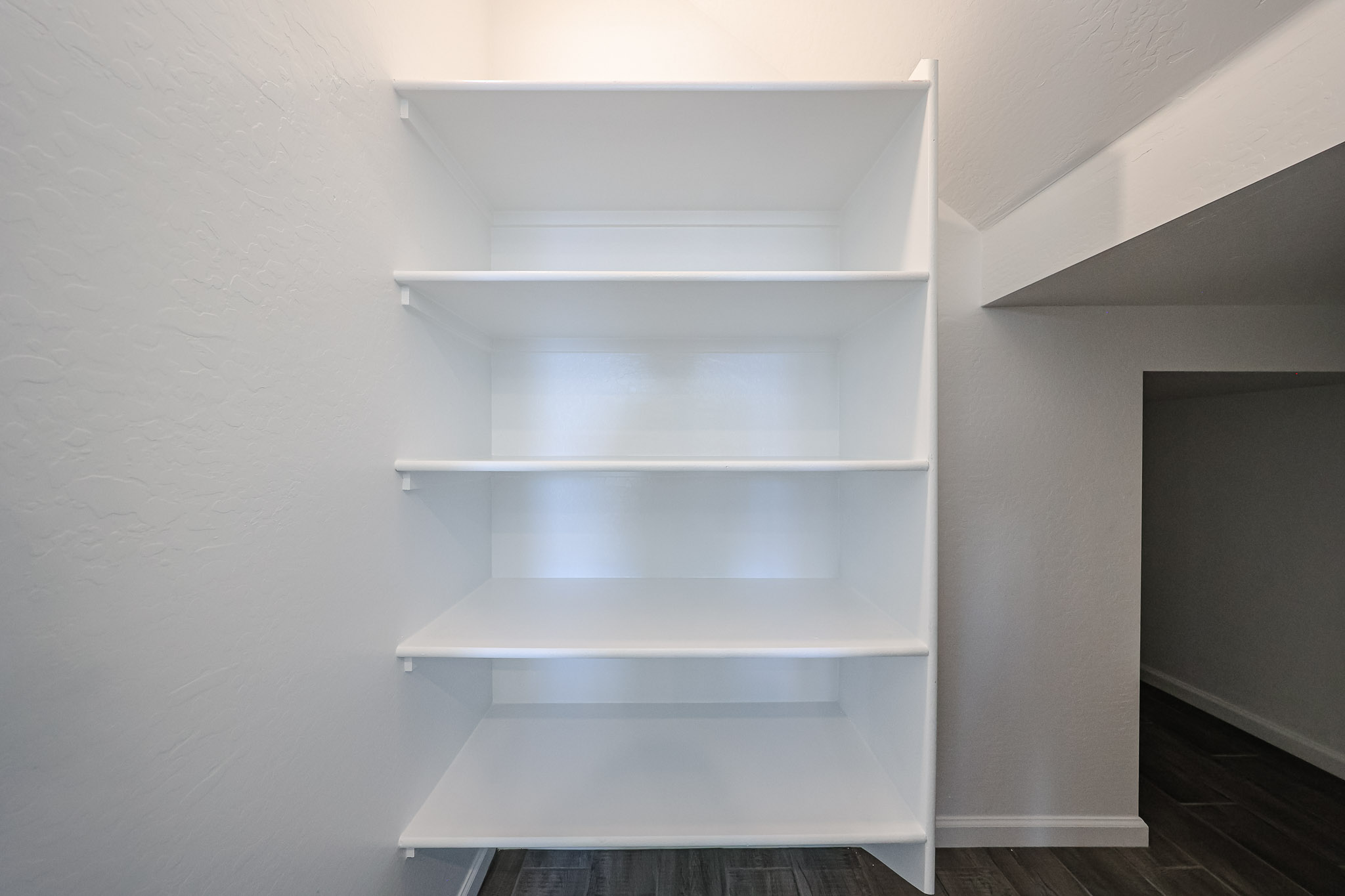 A white shelving unit.