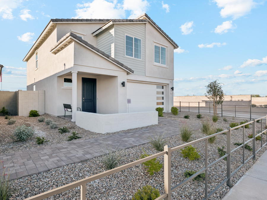 A house with a fence around it.