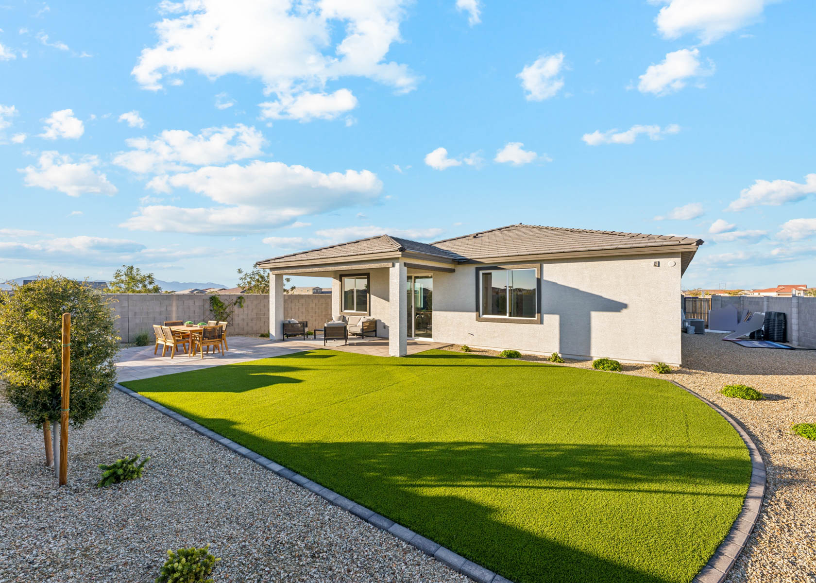 A house with a large lawn.
