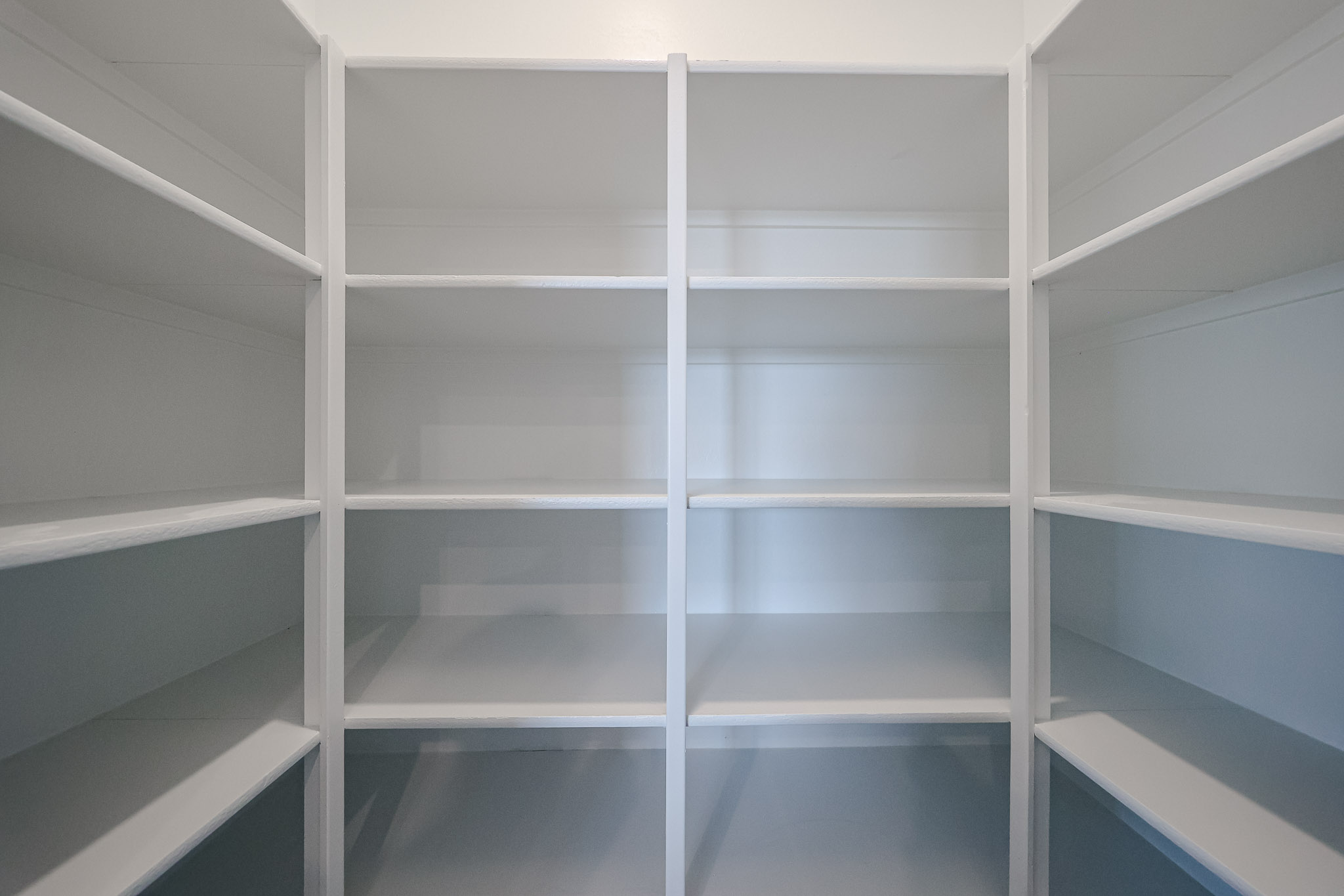 A white shelf with white shelves.