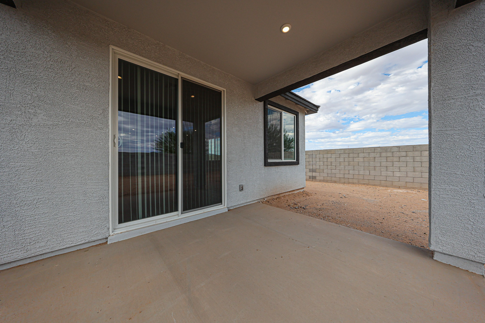 A room with a glass door.