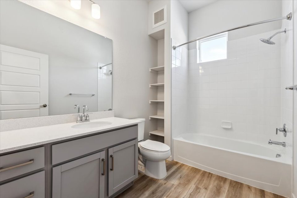 A bathroom with a standup shower.