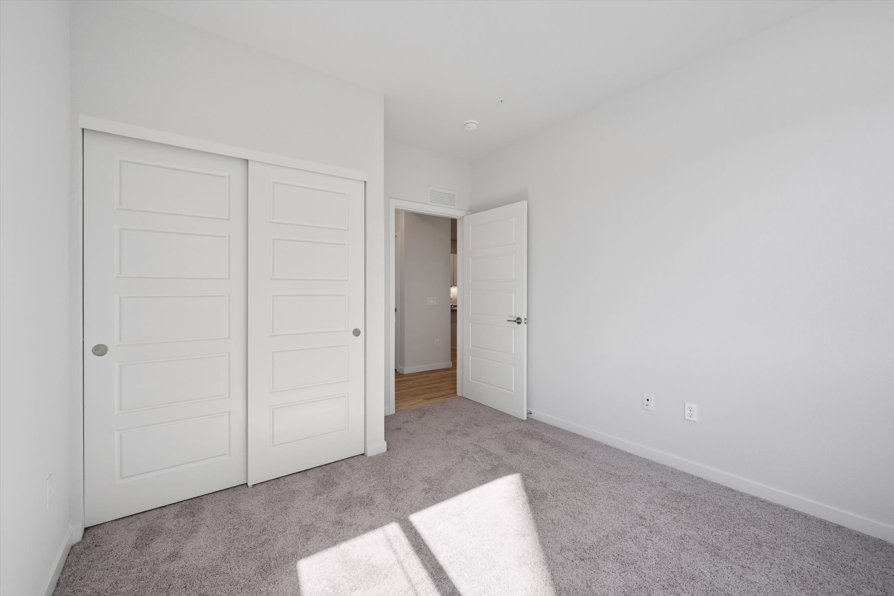 A room with white doors.