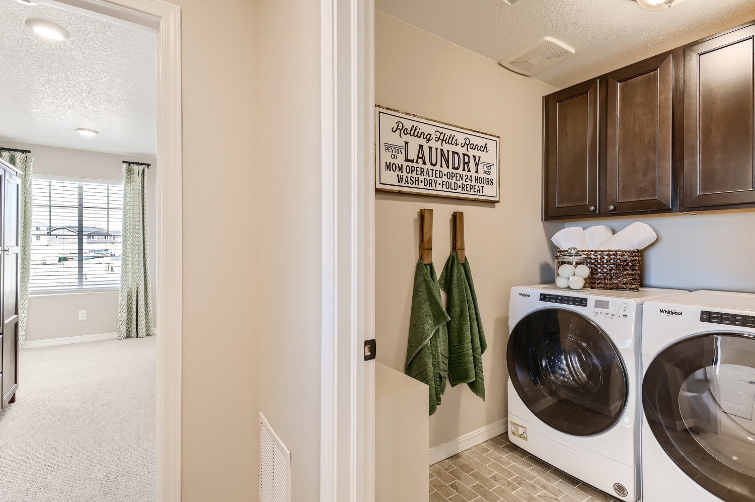 A laundry room with a washer and dryer.