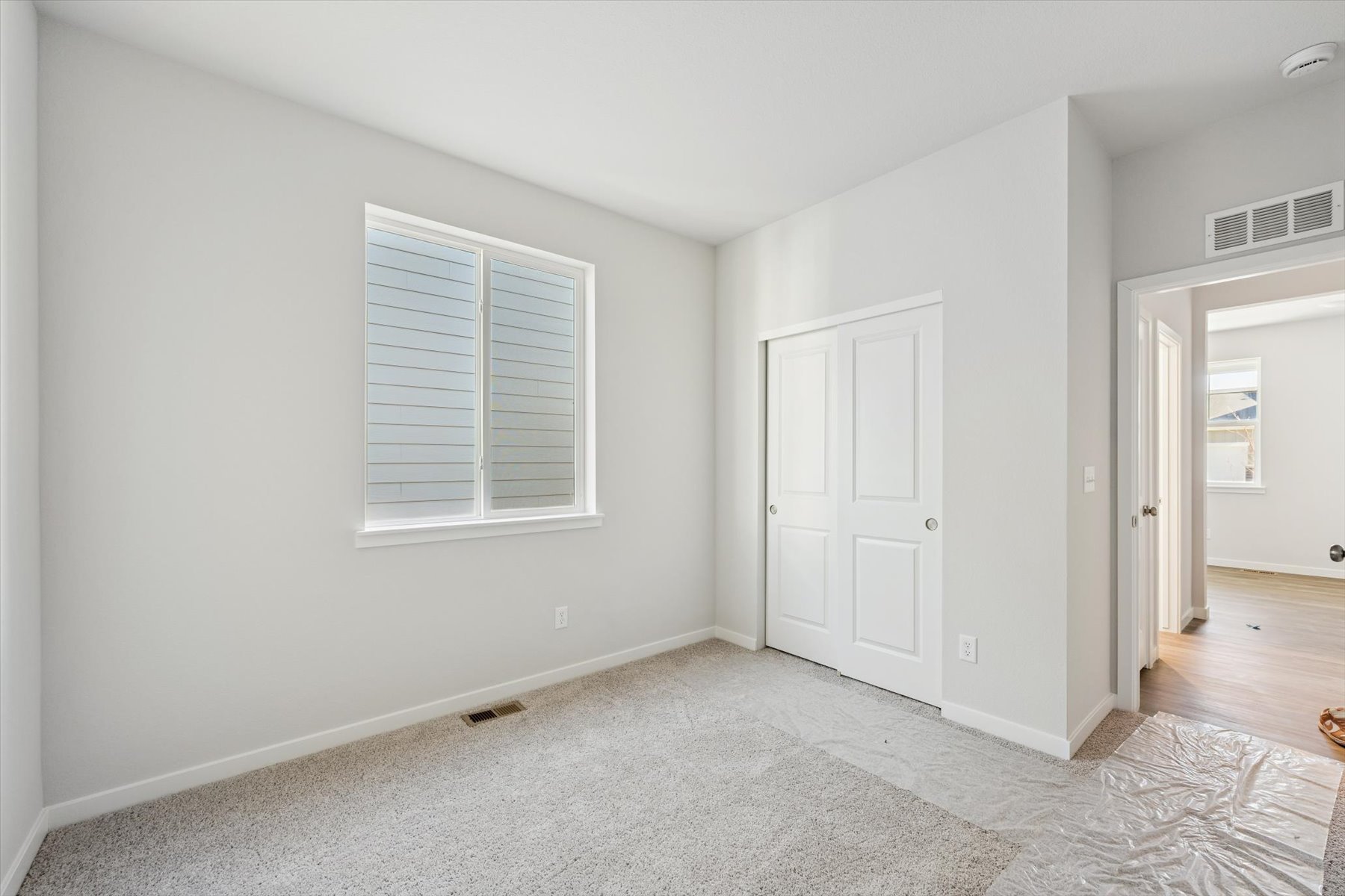 A room with white doors.