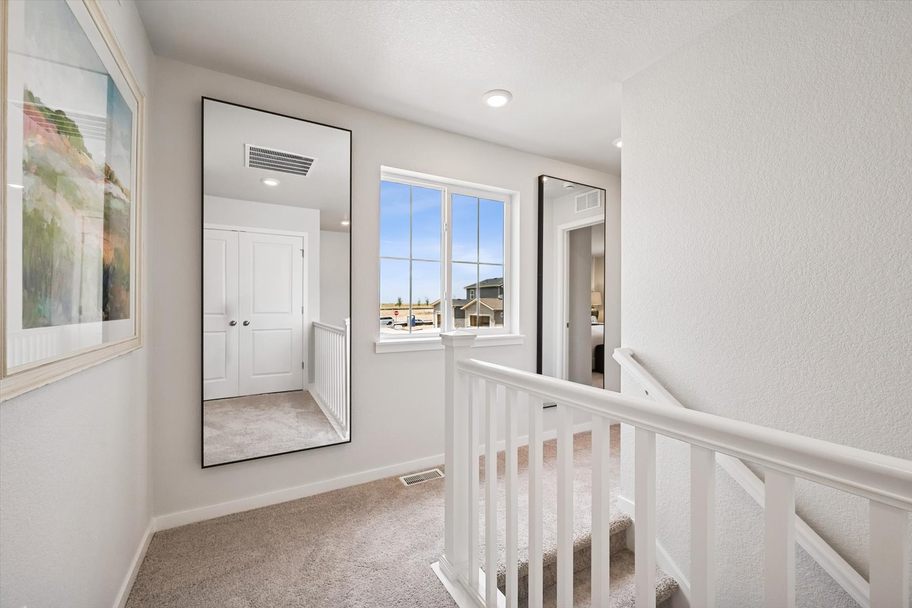 A white staircase in a house.