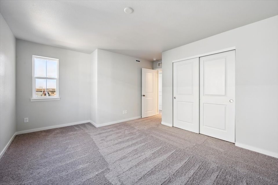 A room with white doors.