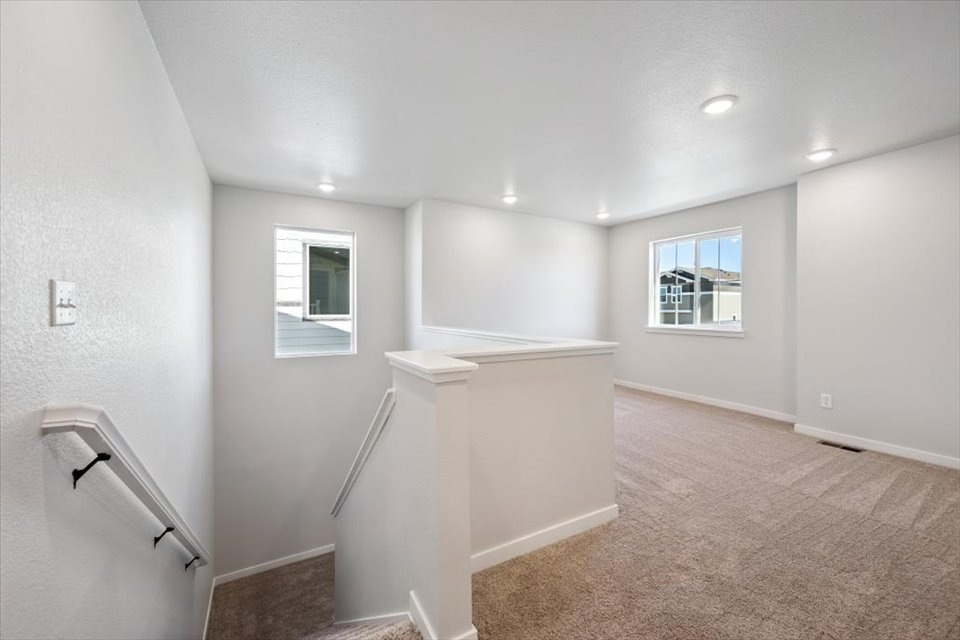 A bathroom with a tub and sink.