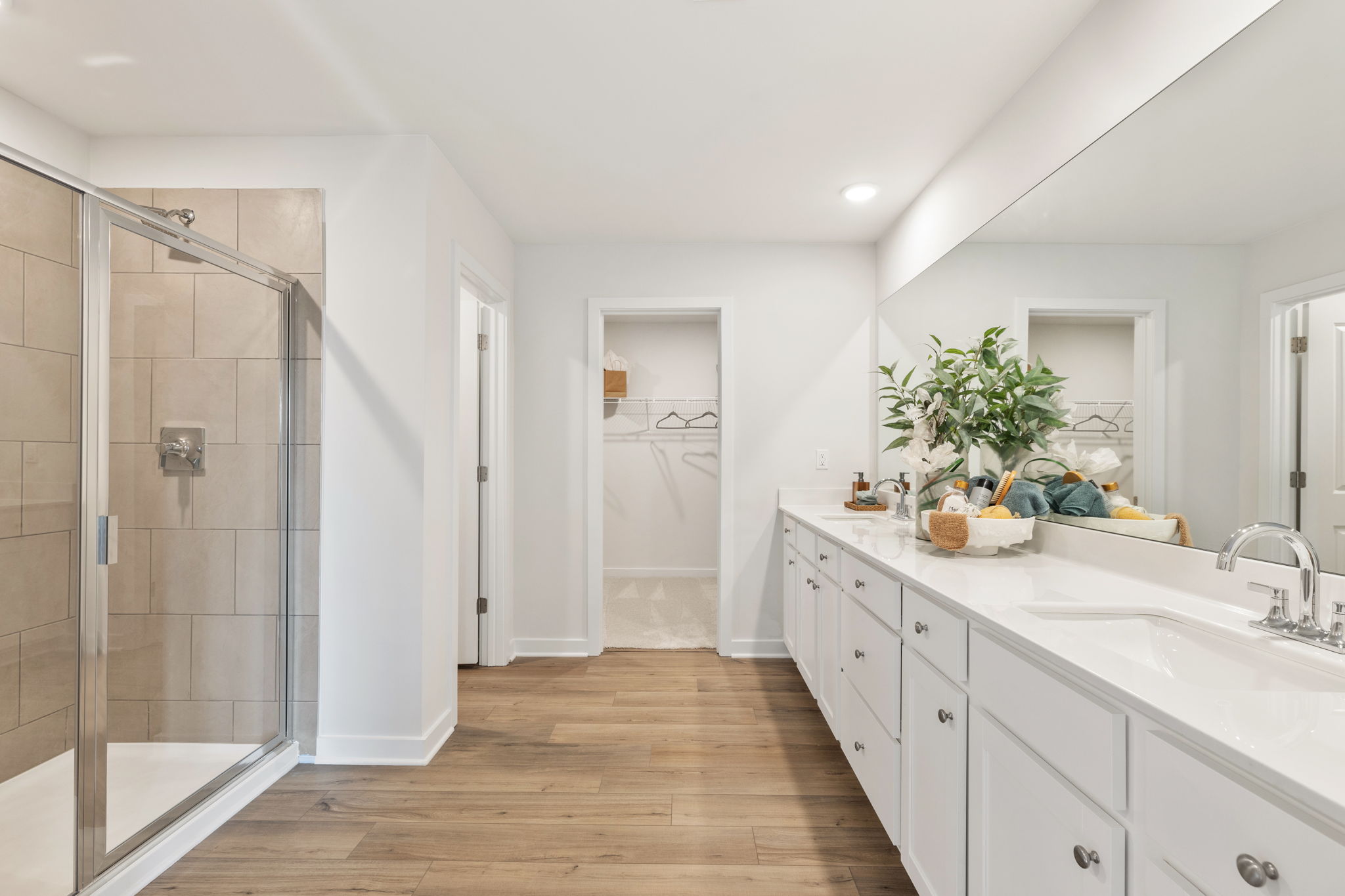 A bathroom with a glass shower.