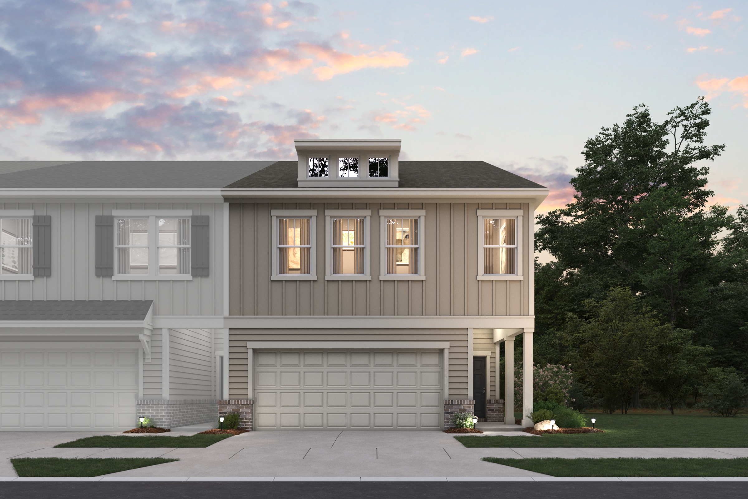 A house with a garage and trees.