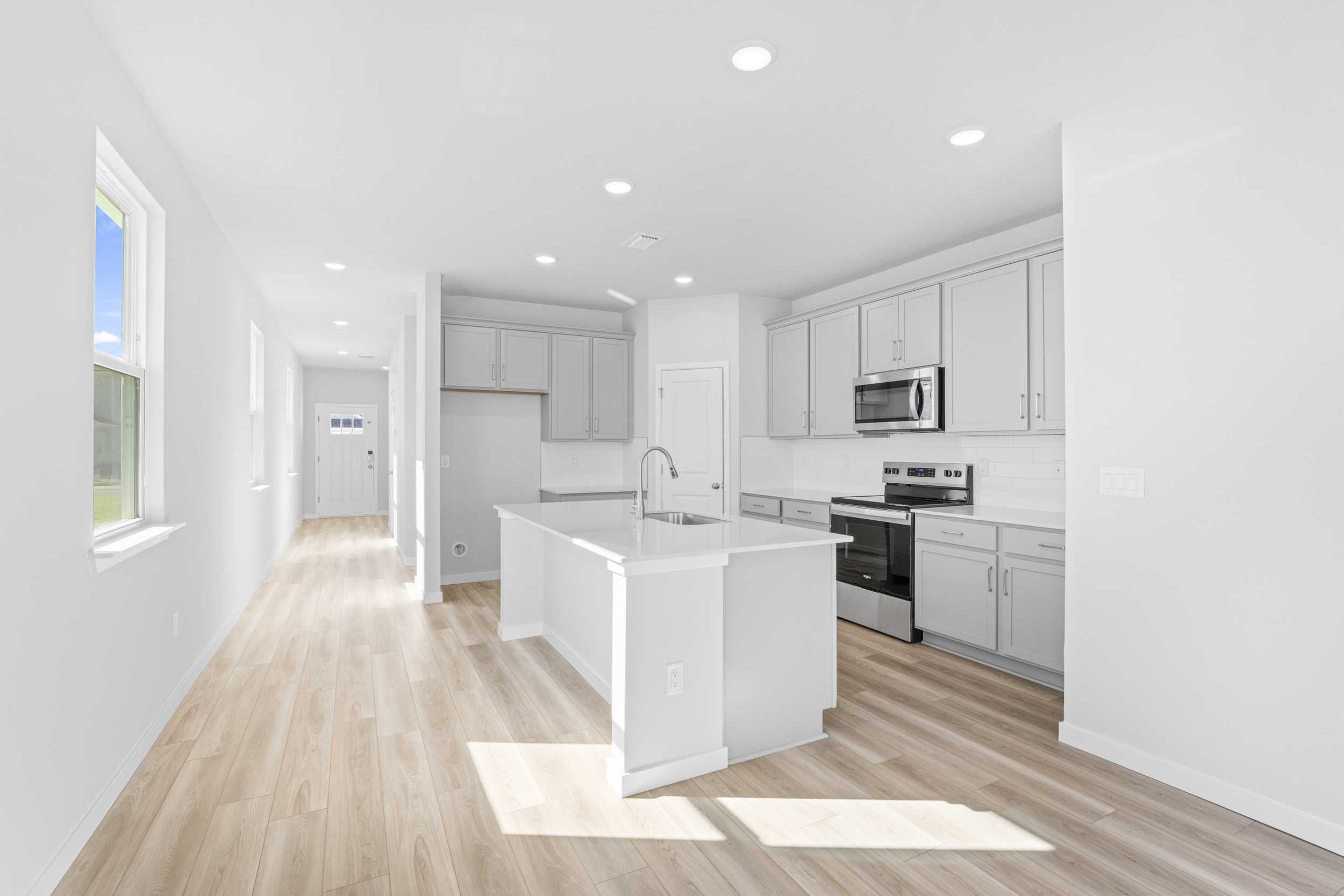 Lot 145 Kitchen with Gray Cabinets at Camden Woods in Kingsland