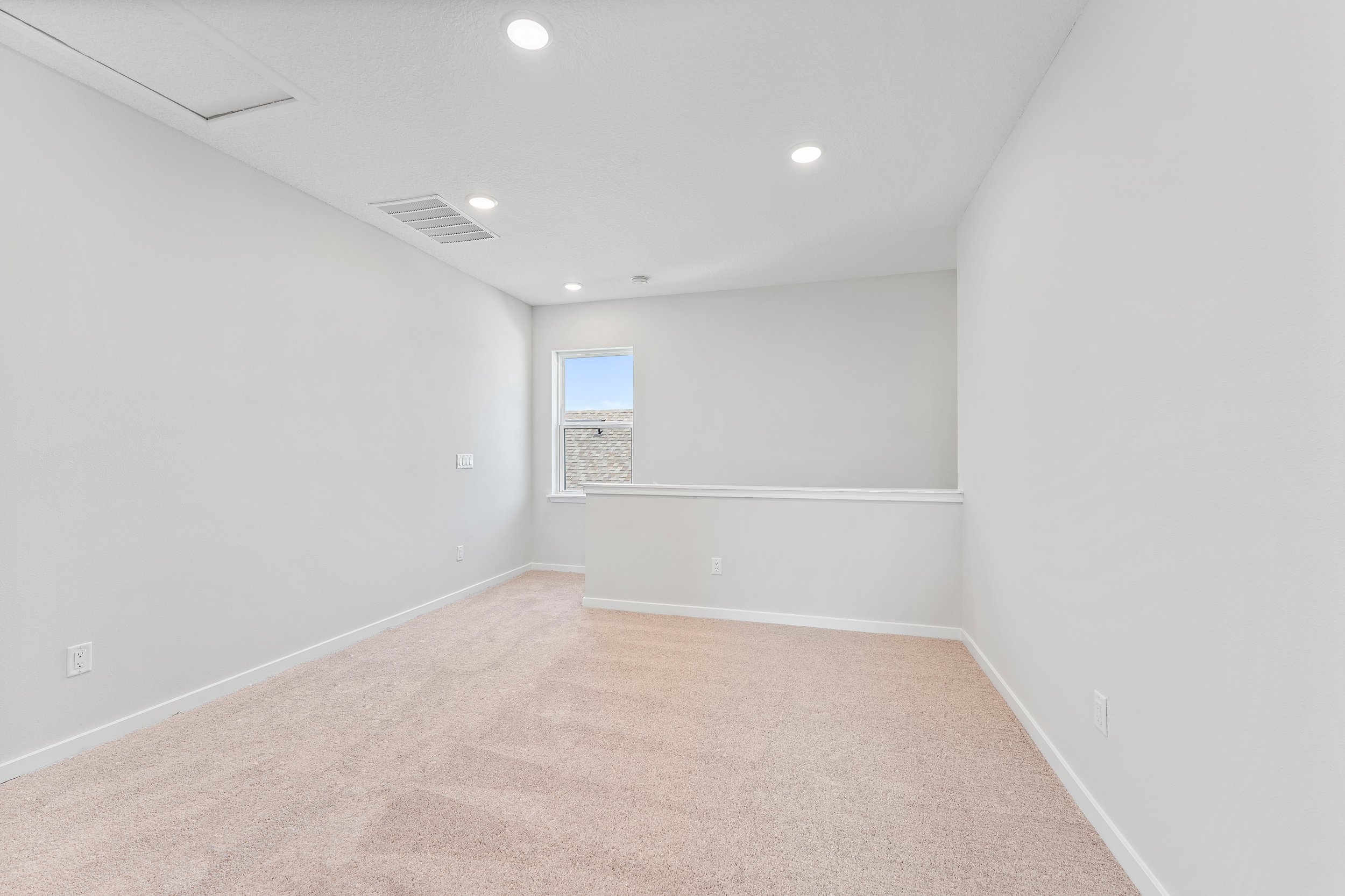 Lot 20 Ponderosa II Open Loft with Window and Stair Half Wall at Camden Woods in Kingsland, GA