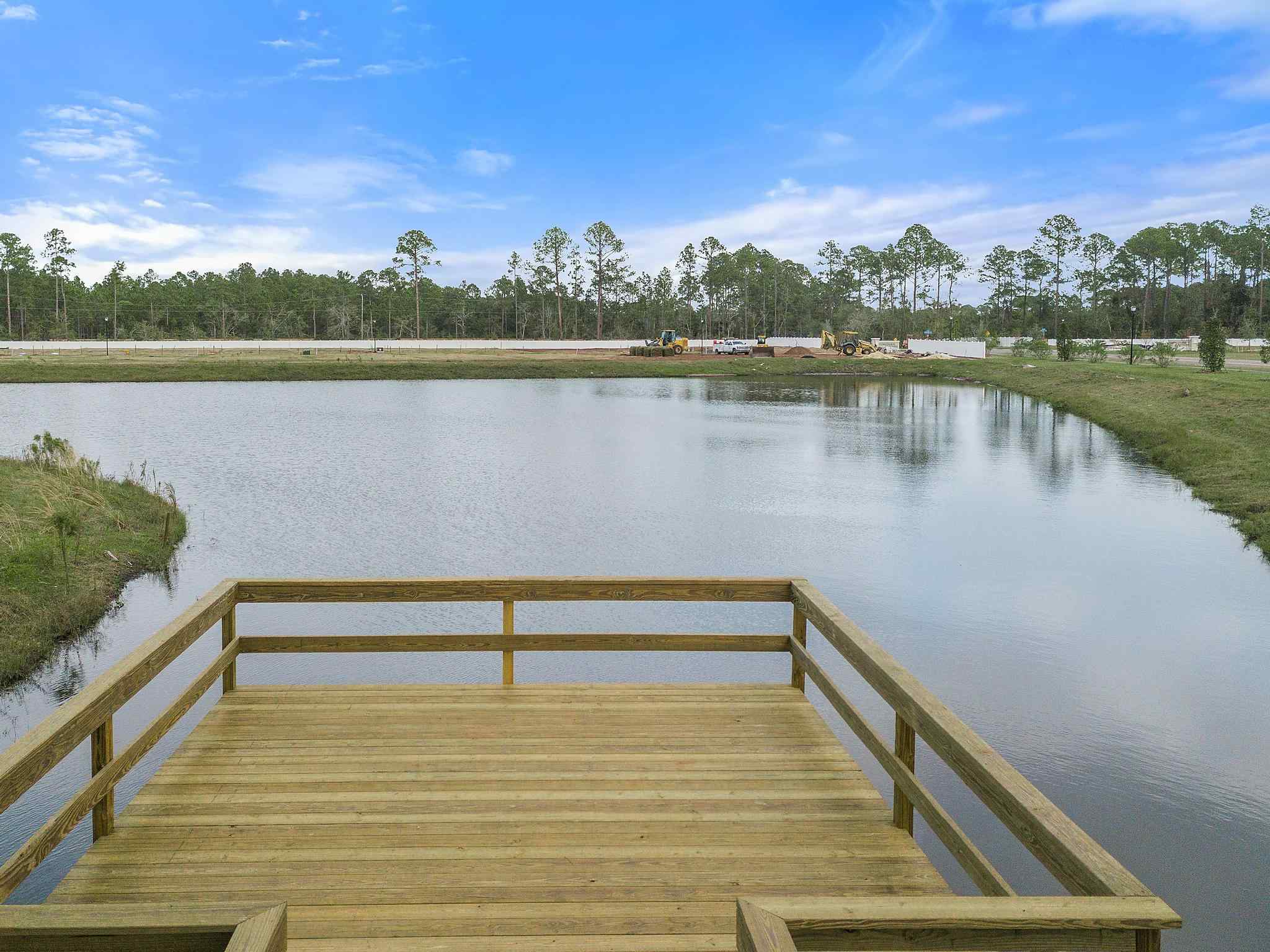 A wooden dock over a body of water.