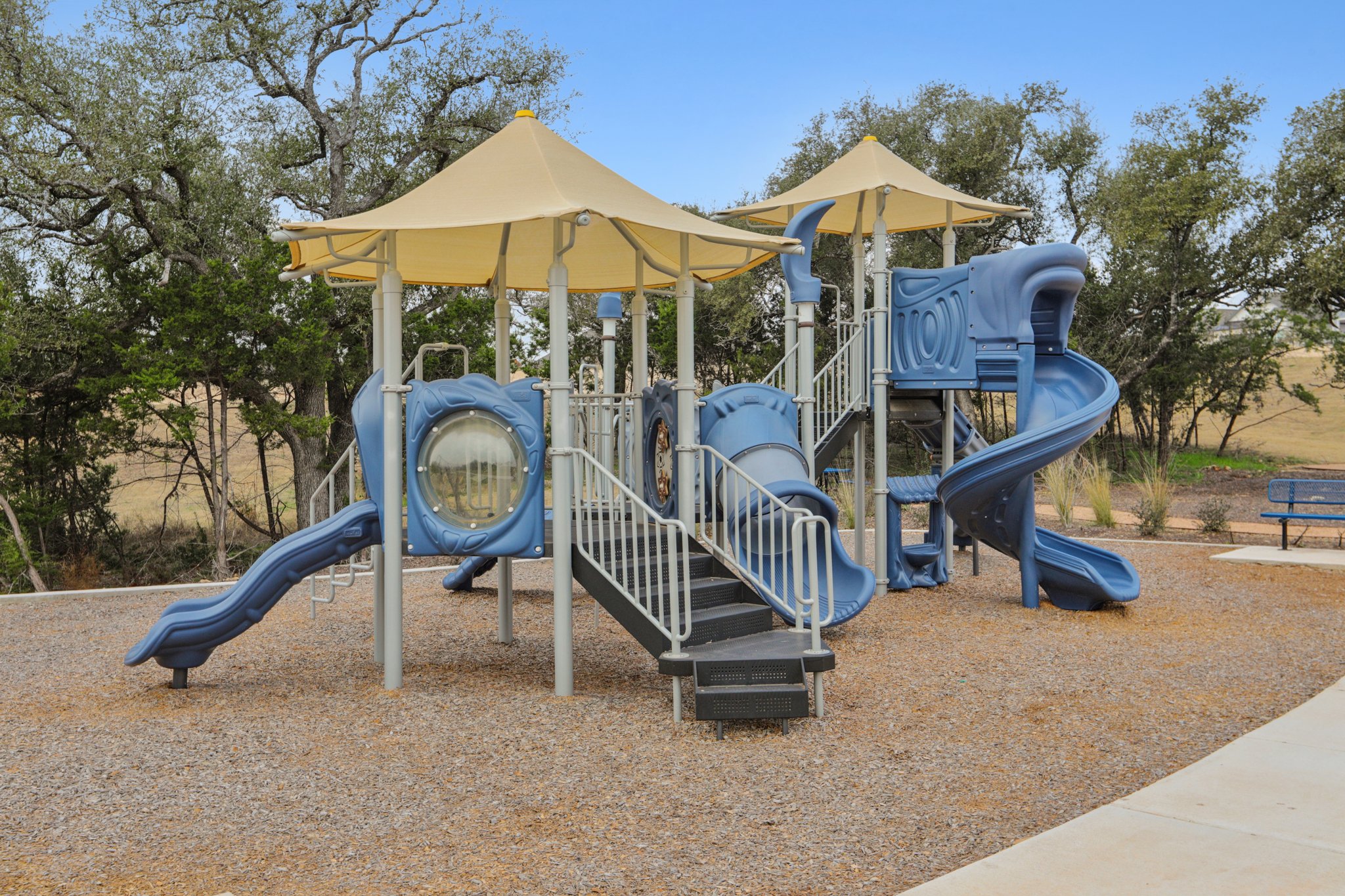 A playground with slide and slide.