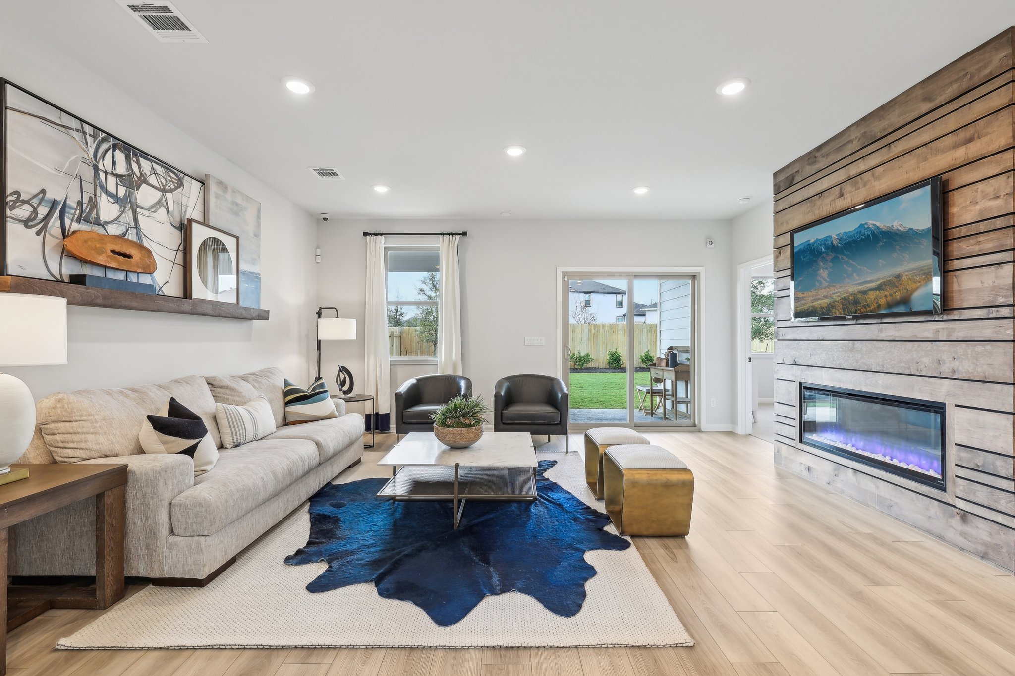 A living room with a fireplace.
