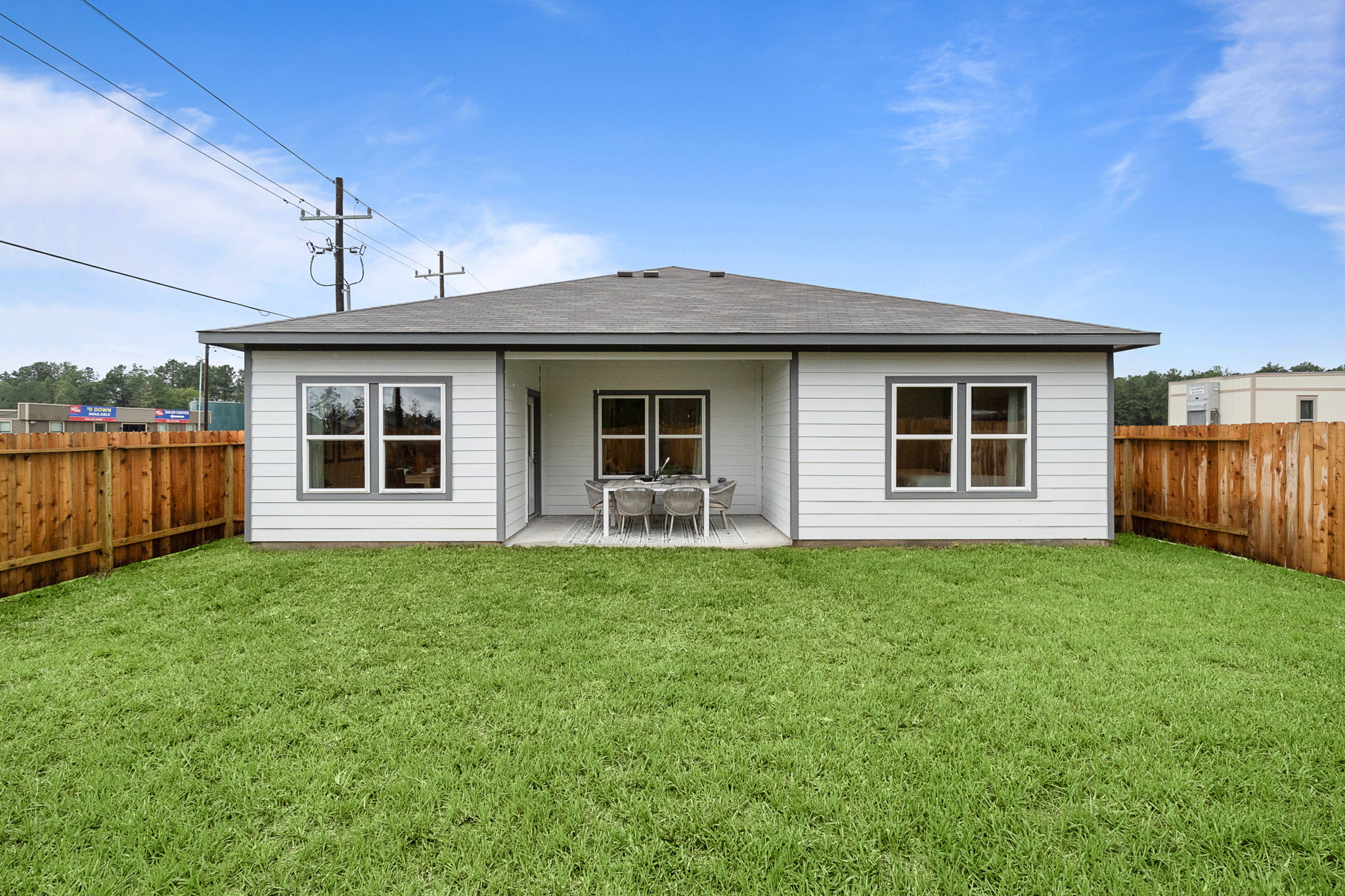 A house with a fence around it.