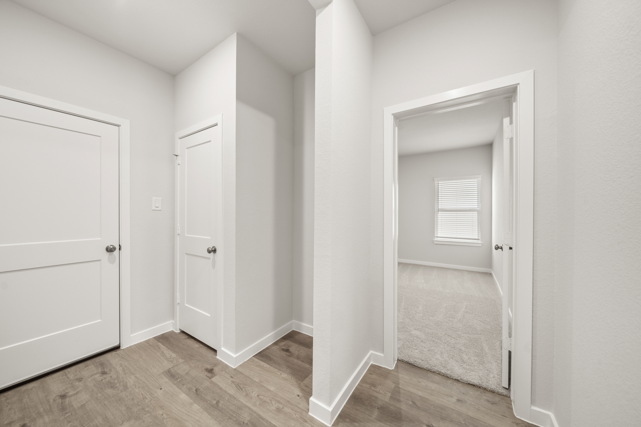 A room with white doors.