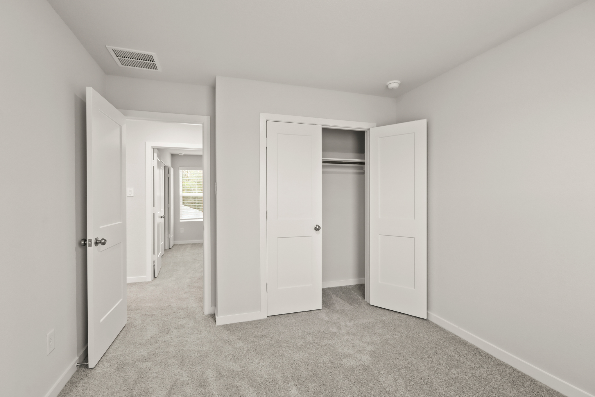 A room with white doors.