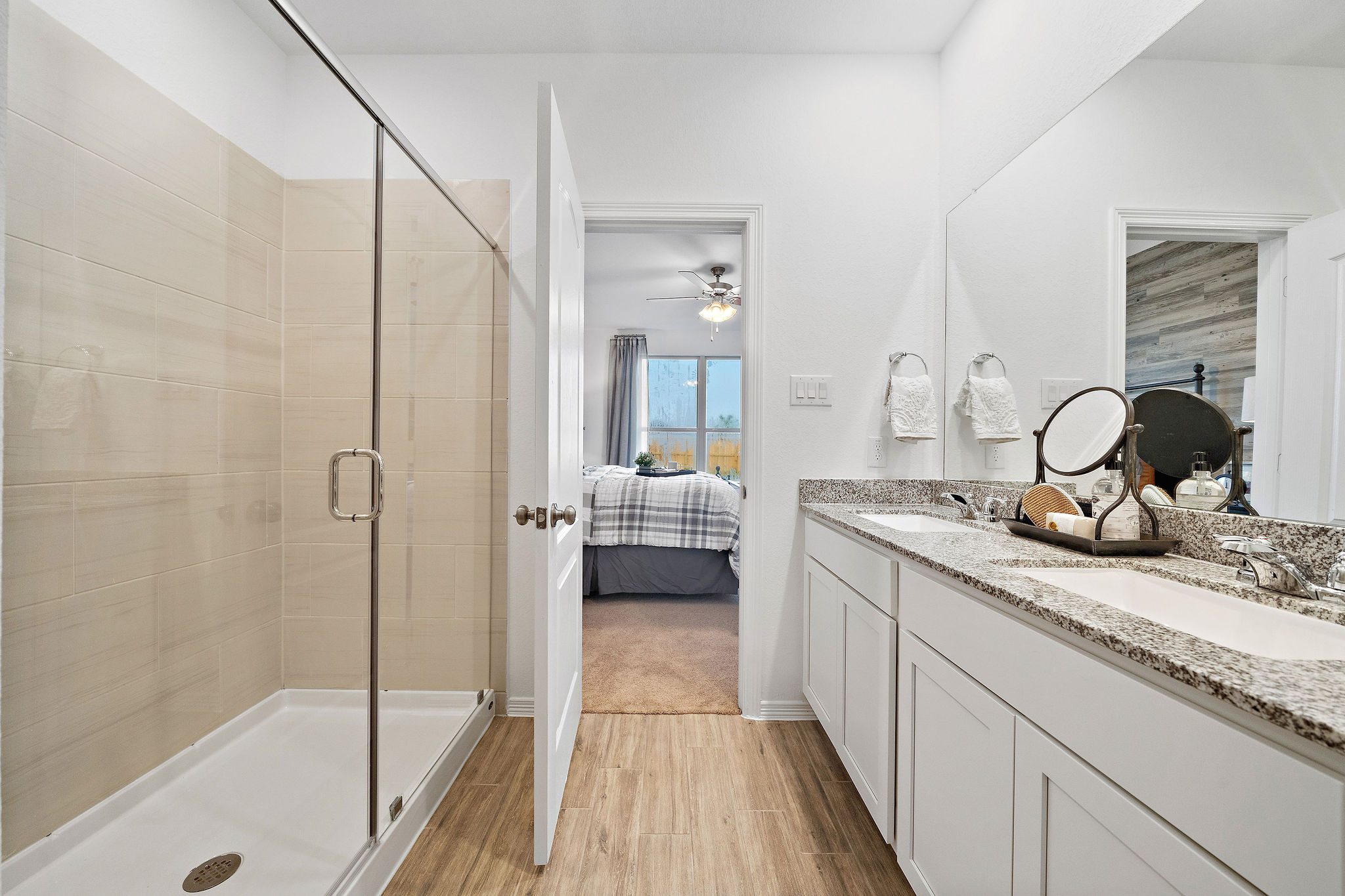 A bathroom with a glass shower.