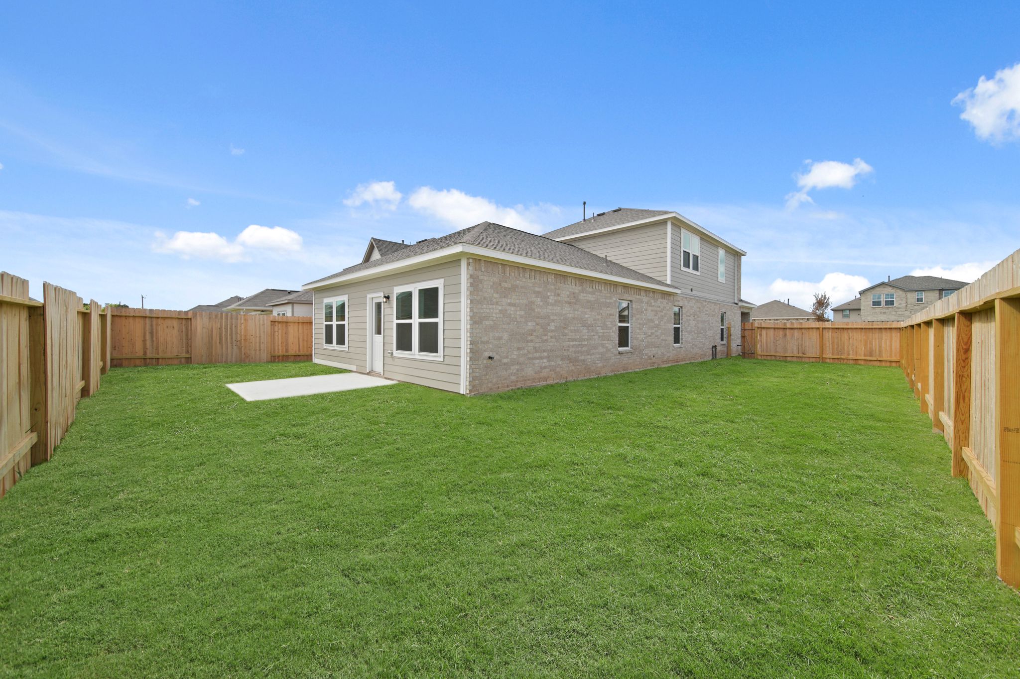A house with a fence around it.