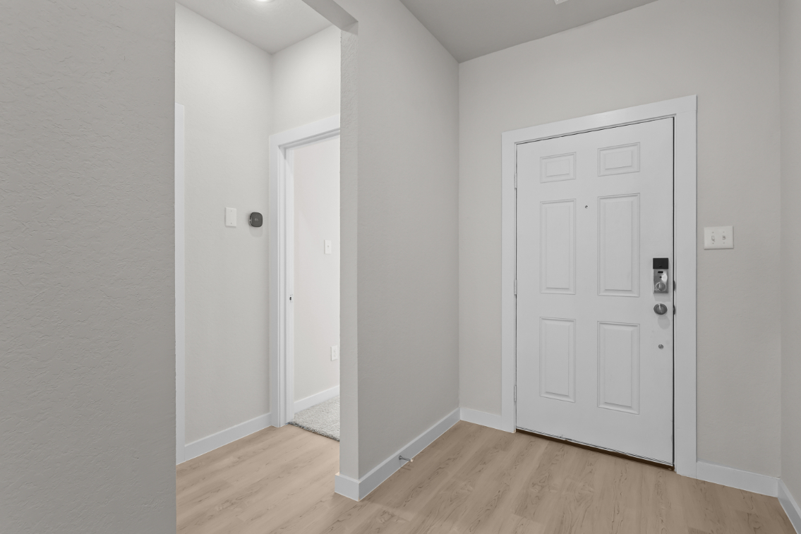 A room with white doors.