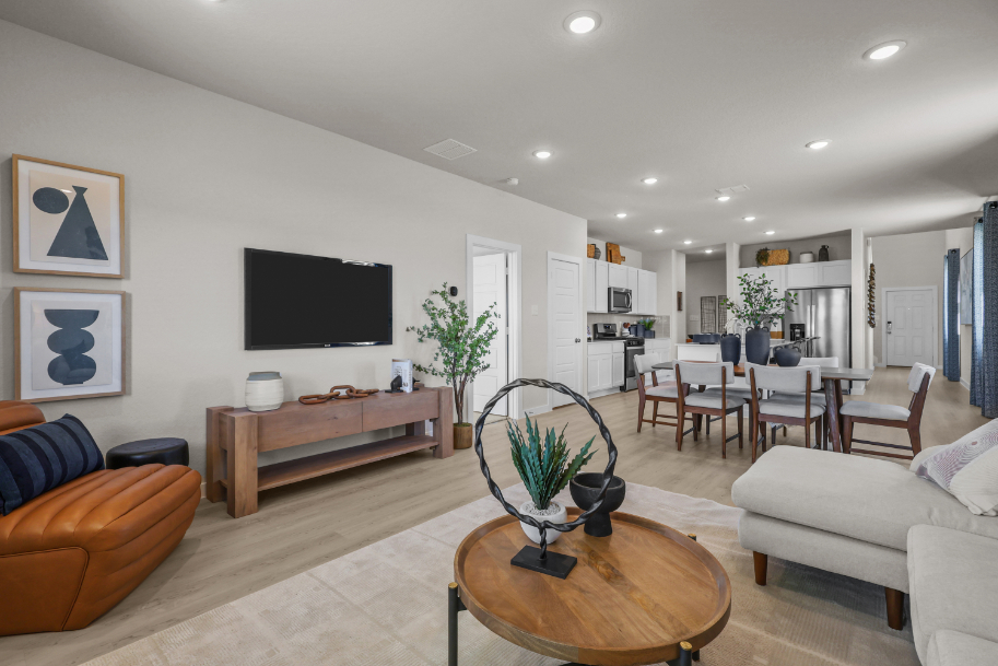 A living room with a tv and couches.