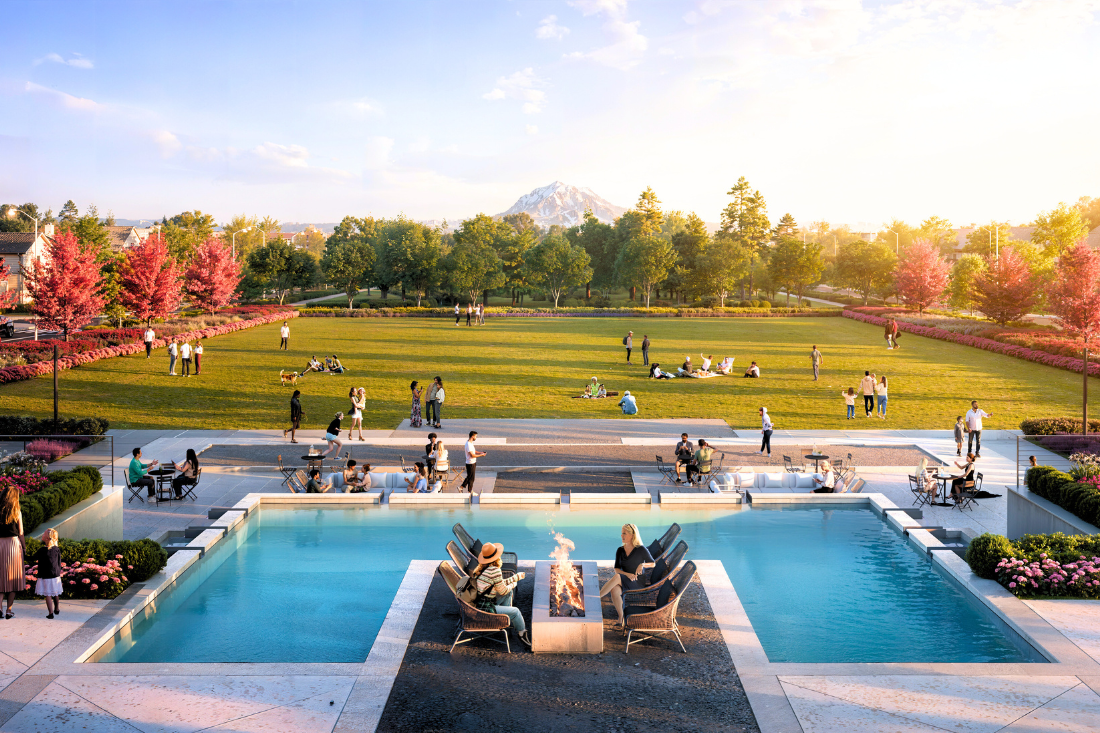 A group of people sitting around a pool in a park.