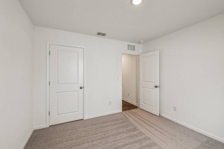 A room with white doors.