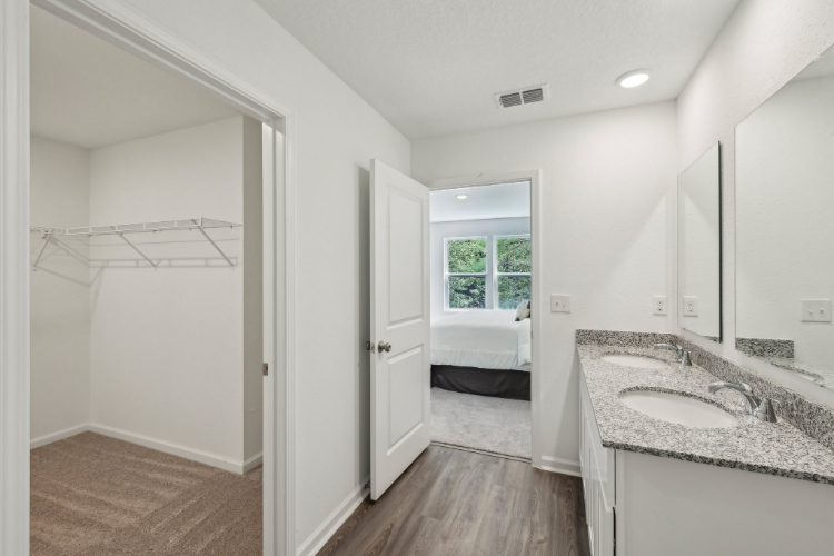 A bathroom with a sink and a bathtub.