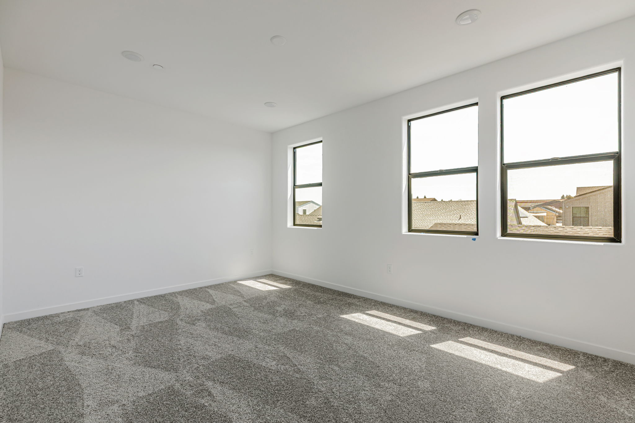 A room with a few windows.