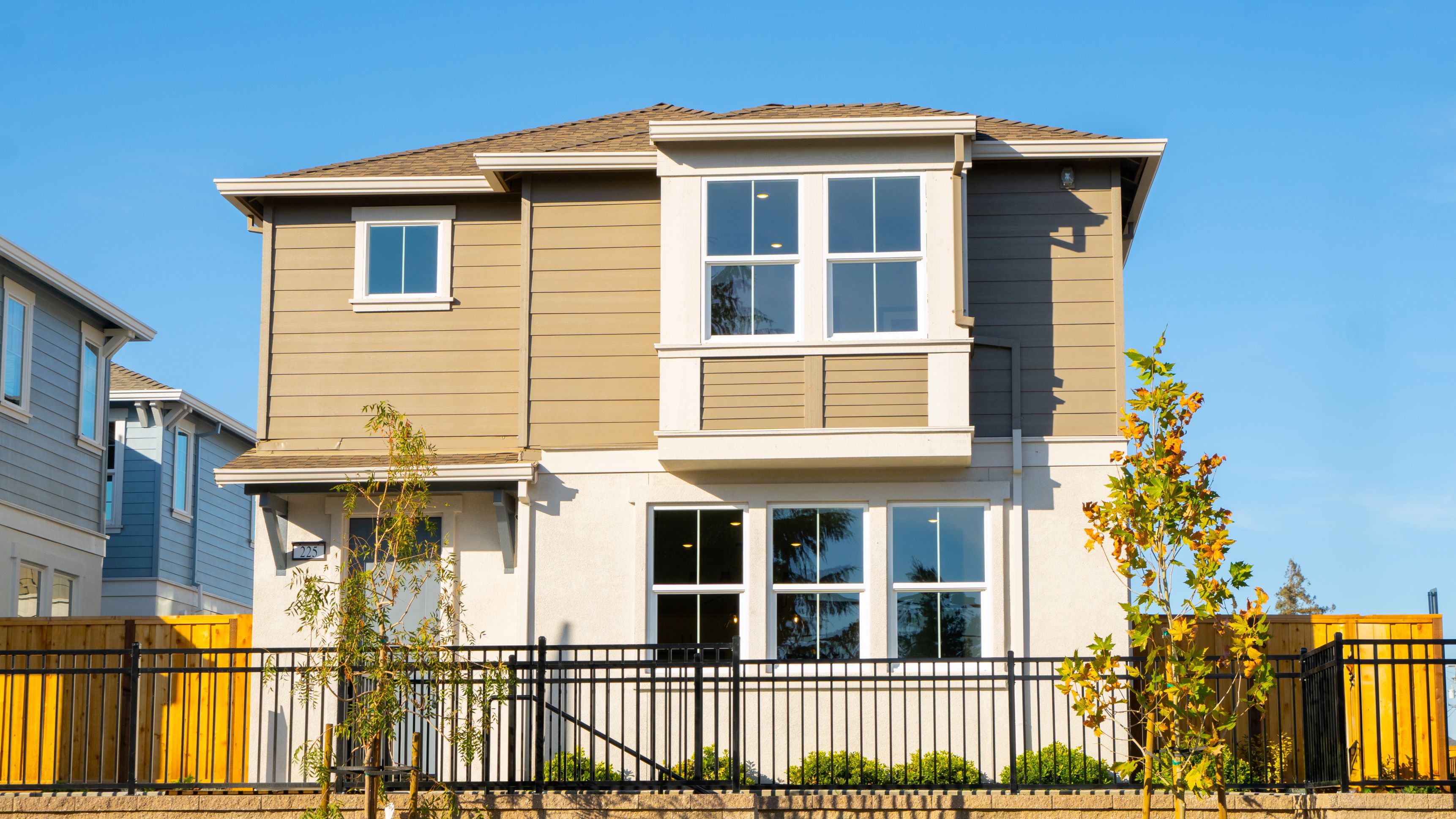 A house with a fence around it.